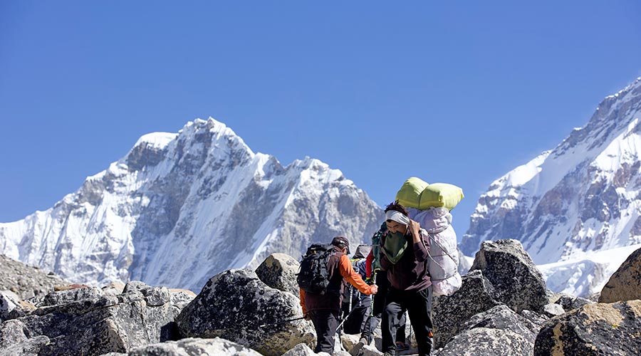 porter caring loads during everest base camp trek porter caring loads during everest base camp trek