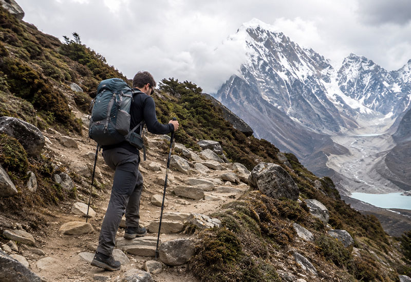 trekking using trekking pole during ebc trek
