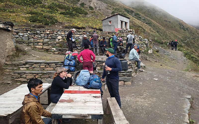 Trekkers and Porter taking rest during Annapurna Circuit Trek